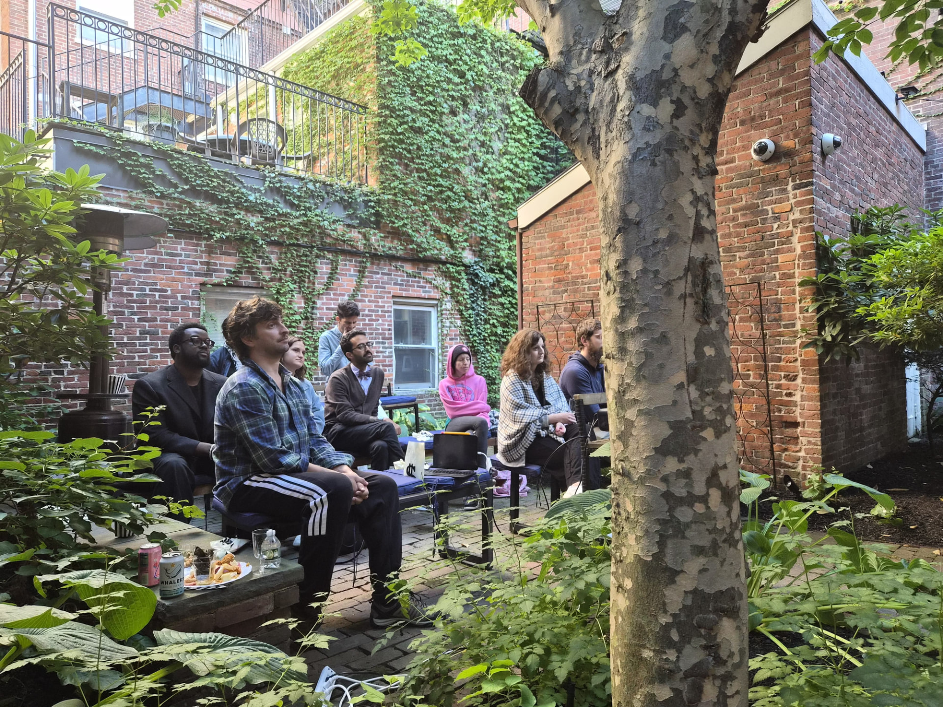 Guests gathered in the courtyard at the inaugural Joker salon